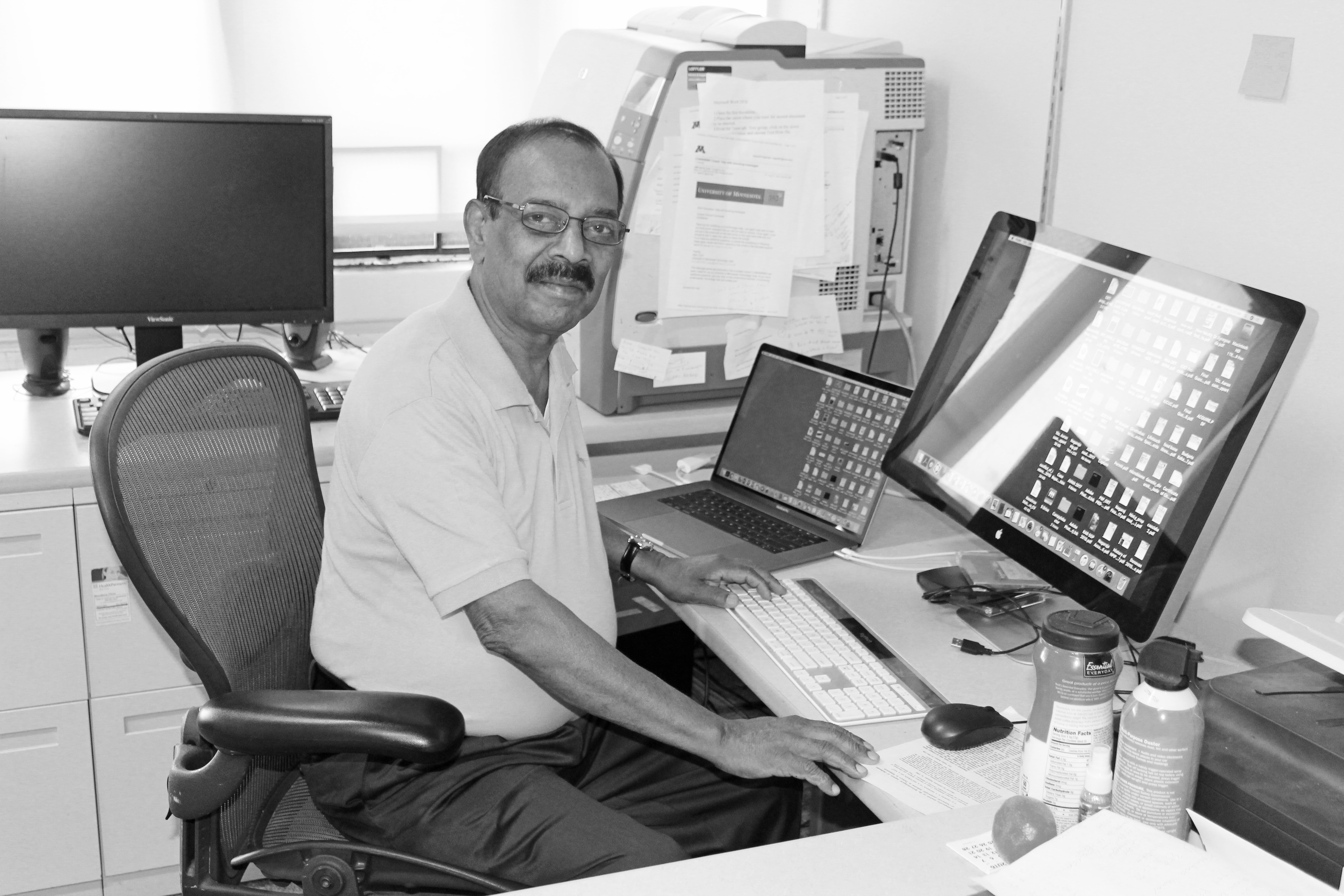 Dr. Nagaraja at his office desk