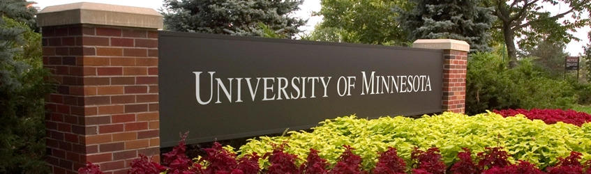 University of Minnesota sign behind flowers