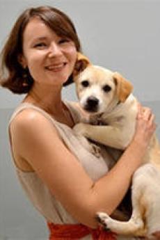 Violeta Bonneville holding a puppy