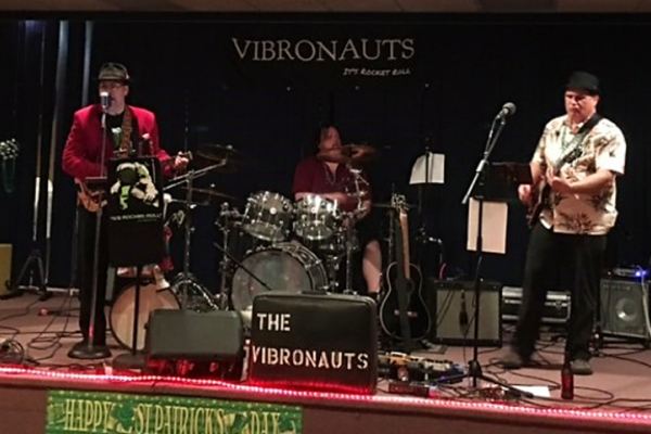 The Vibronauts, including Dr. Kent Reed, play on stage