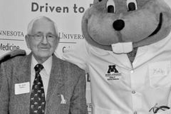 Alvin Weber with Goldy Gopher